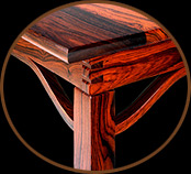 Cocobola Dining Table: close up of table leg and dovetailed apron