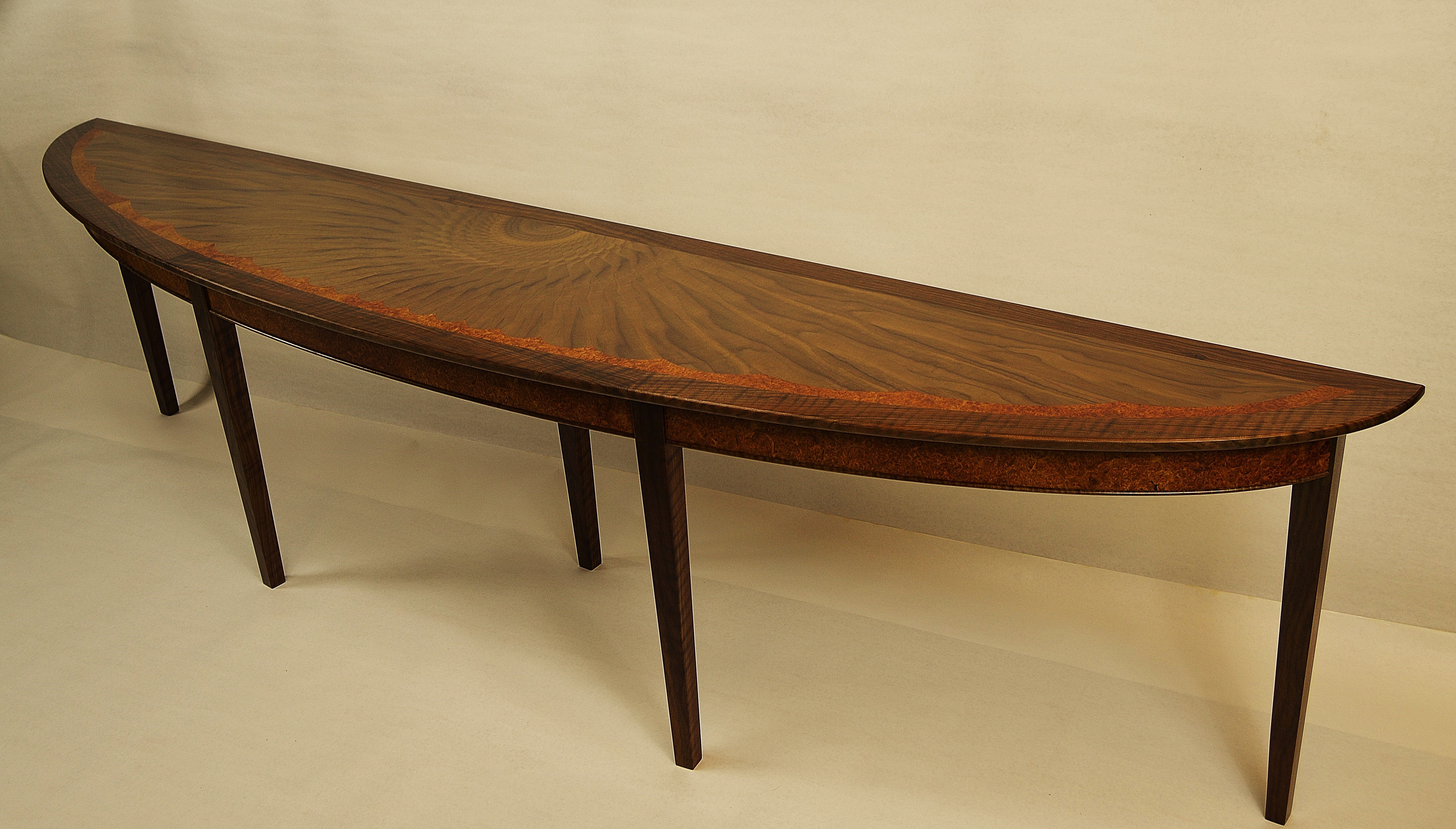 An 8 foot sofa table by Don DeDobbeleer, Fine Custom Wood Furniture