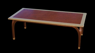 A Bubinga and curly western maple coffee table by Don DeDobbeleer